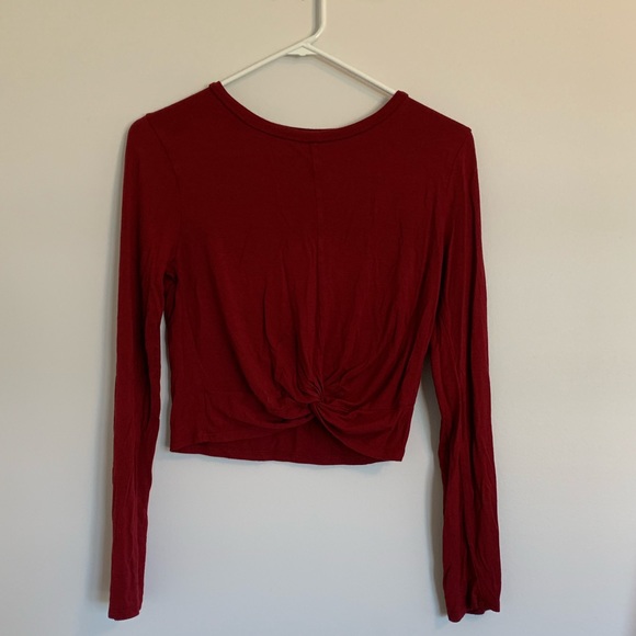 red cropped long sleeve shirt